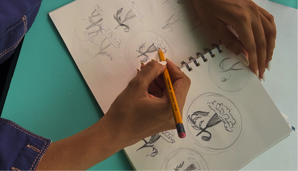 Hand-drawn botanical sketches in a spiral notebook